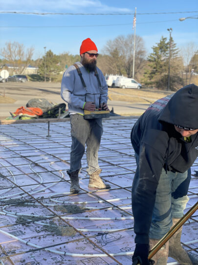 Channing Alto from Alto Concrete Pumping working together with LLB Concrete to pour concrete.